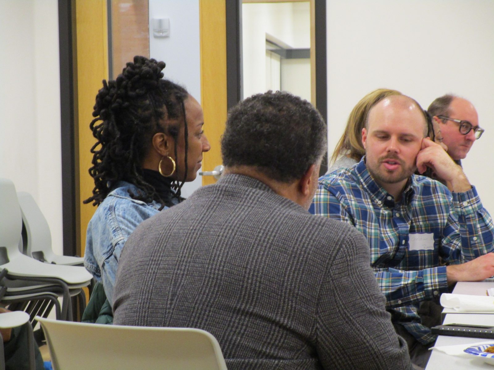 Neighbors in conversation at a Black Equity Coalition community session